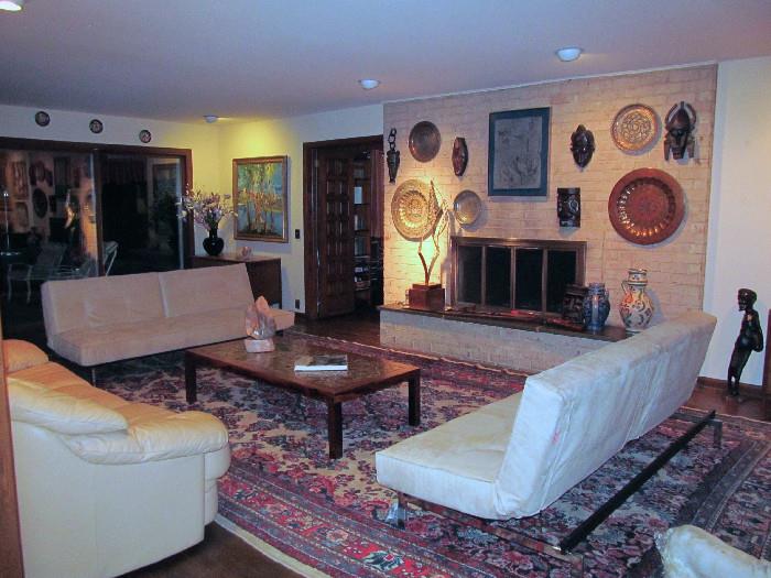 FABULOUS MID CENTURY LIVING ROOM, LEATHER CURVED SOFA, PAIR SUEDE SOFAS, ORIGINAL ART WORK, SCULPTURES, BRONZES....