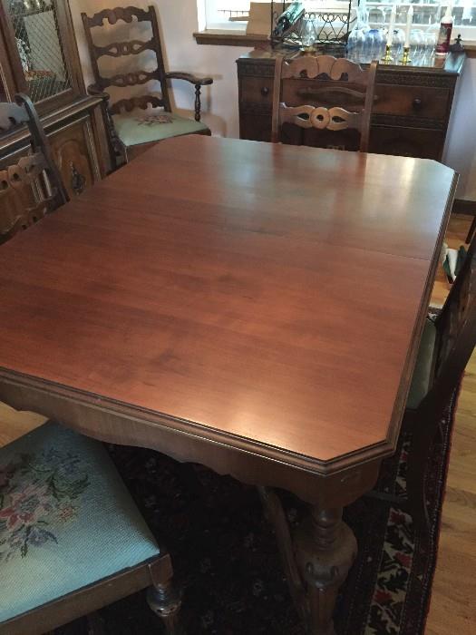 Beautiful antique dining room table with ball and claw foot