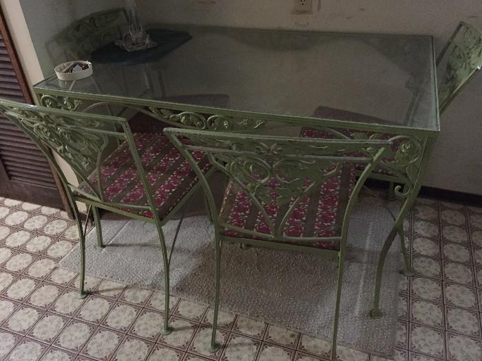 vintage wrought iron table and chairs
