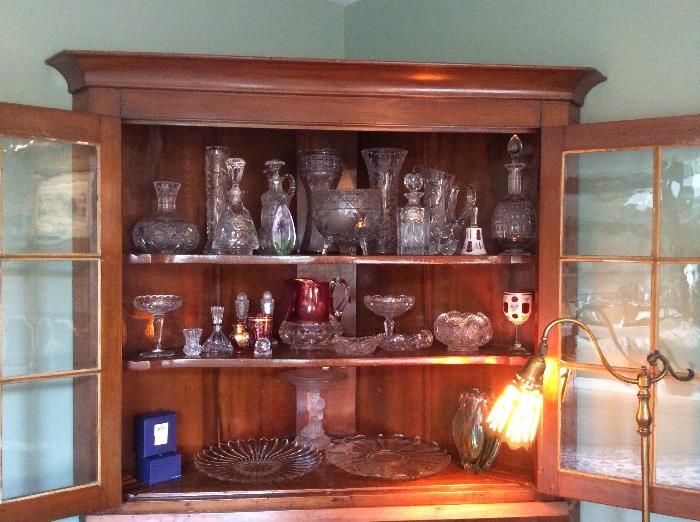 Corner cupboard with cut and pressed glass