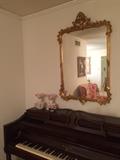 one of the Italian mirrors over the Knabe Piano and bench