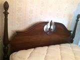 four poster mahogany bedand very nice like new mattress