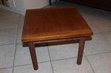 Two matching Japanese teak end tables.