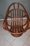 Bentwood rattan swivel chair frame, one of two matching chairs.