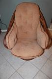 Rattan chair with cushion, one of two matching.