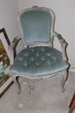 Tufted blue velvet chair.