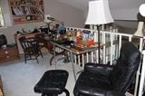 Black chair and stool, Sligh writing desk, Saltman night stand, office supplies, frames and books.
