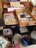 Box of original black and white photos and film slides. Boxes of old paperwork from the early 1900s