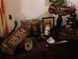 Old license plates and tins. Vintage fixtures