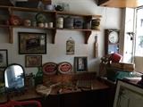 Vintage beer signs, antique tennis rackets, one of many great mirrors