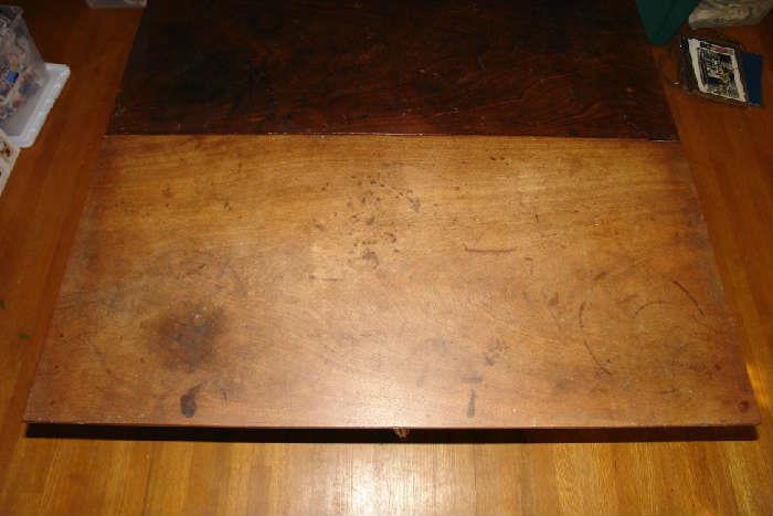 Walnut leaf of center section of table. Note that is made from one piece of wood.