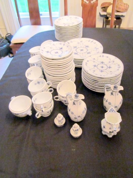 12 piece place setting Royal Copenhagen Half Lace china. plus salt & pepper shakers. Plates not shown are in china cabinet.