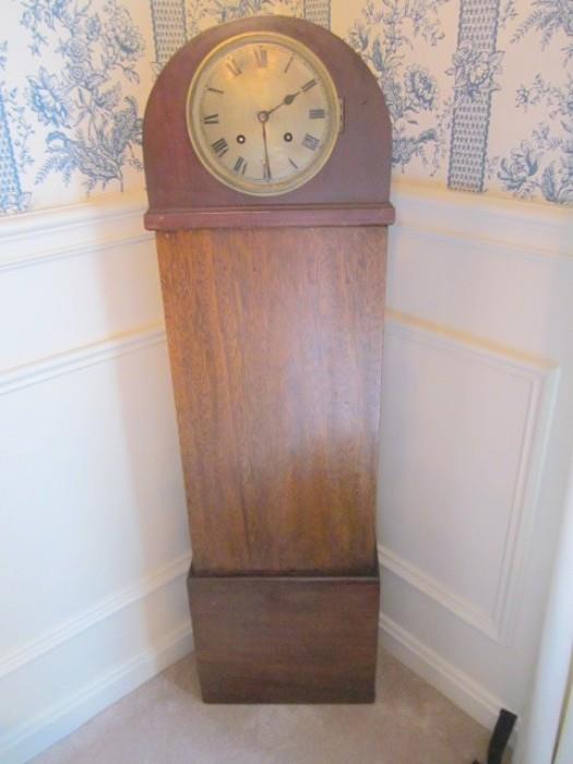 Antique mantel clock on stand.