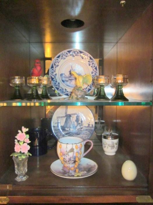 Items in china cabinet.