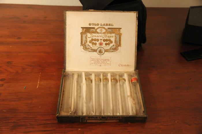 Gold label cigar box with glass tubes
