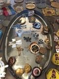 Assorted lapel pins and other antique collectibles