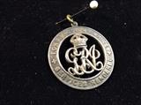 The Silver War Badge, sometimes wrongly referred to as the Silver Wound Badge, was  instituted from 12 September 1916 under Army Order 316. It is a circular badge with the legend “For King and Empire – Services  Rendered” surrounding the King George V cypher. The badge had a pin for wear as a brooch.
