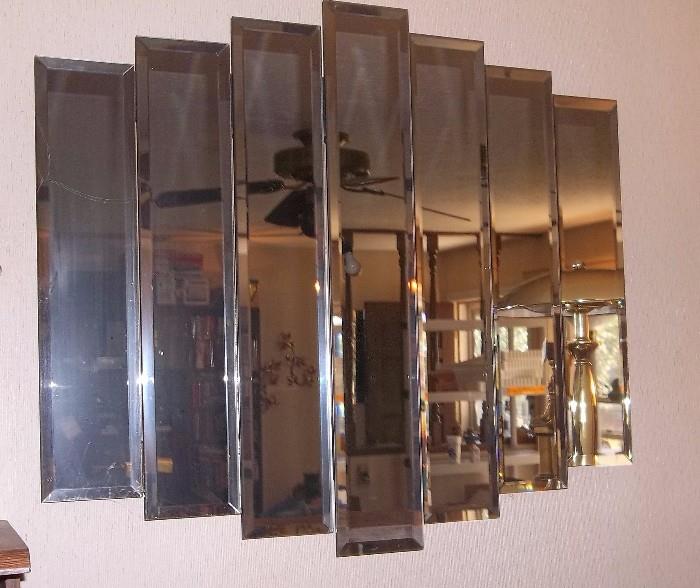1960s beveled glass mounted mirror strips.  Truly Retro