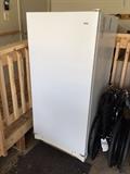 Working stand up freezer in garage and easy to move 