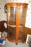 Large oak curved front china / curio cabinet