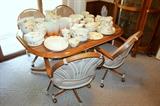 Kitchen table with 4 rolling chairs