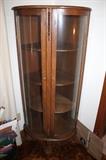 Small corner curved front curio / china cabinet