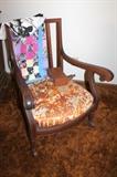 Antique rocking chair and quilt