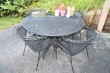 Round metal table and 4 chairs