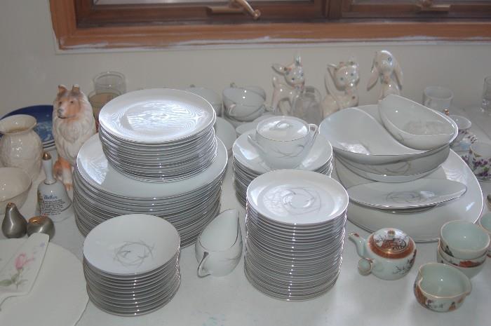 Complete set of Sango China with all serving platters and bowls.
