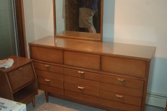 1950's Bedroom set with night stands chest of drawers and mirror.