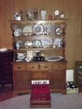 china cabinet, anniversary plates, cups, china, stainless silverware set, reel to reel portable player