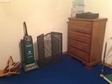 vacuum, fireplace screen, dresser, dvd/vhs player