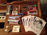 Postcards, pocket knives, KC A's photos