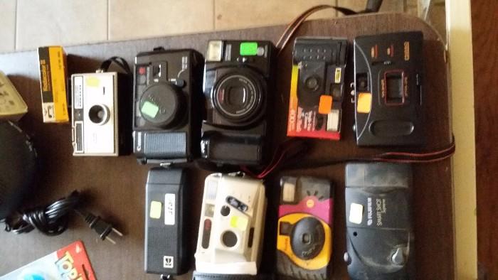 Camera's, kodak, polaroid, nikon, and others