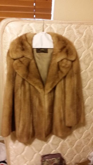 One of 3 Fur Coats