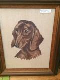      Framed needle point of a dashchund