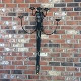One of two decorative wall mounts (great for inside or outside - sold separately)