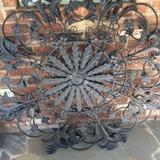  Two large ornamental wall mounts (sold separately)