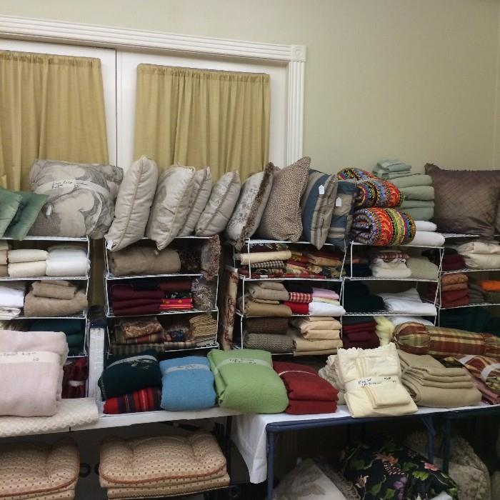   Blankets, sheets, bedding, and decorative pillows