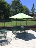 Round table with 4 chairs & umbrella