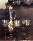 Bavarian decanter with four glasses.