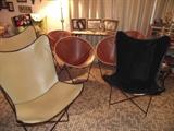 Mid-Century Modern cowhide & leather chairs