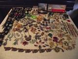 Part of seven boxes of vintage costume jewelry