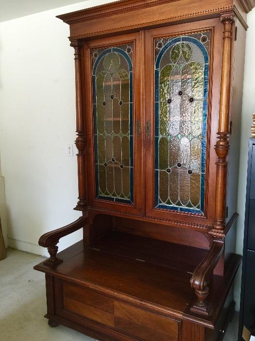 Antique Armoire with letter glass doors.