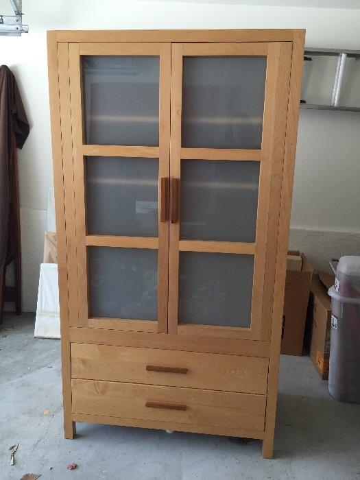 Solid wood Armoire with frosted glass.