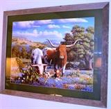 Framed longhorns in Texas blue bonnets