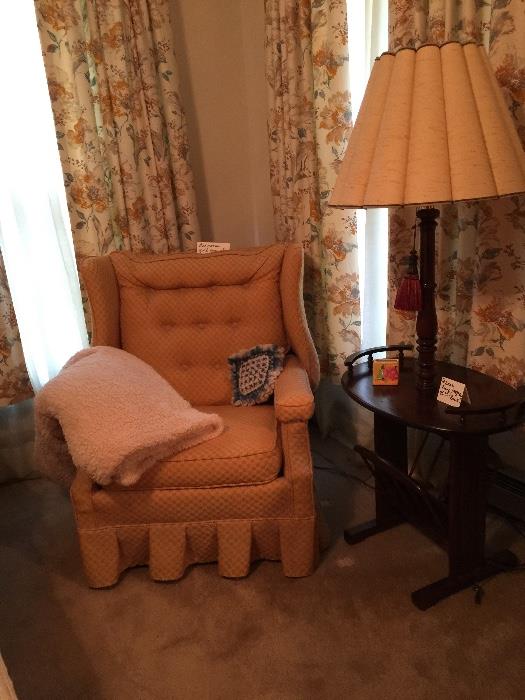 Tan bedroom chair, blanket, drapes.  Lamp has sold.