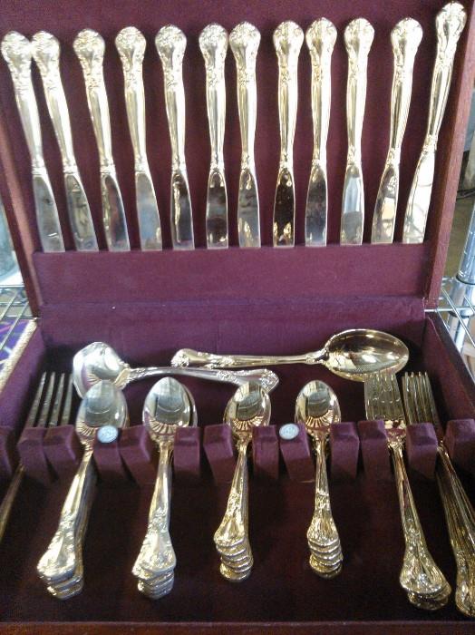 51 piece gold plated Godinger Silverware Set 