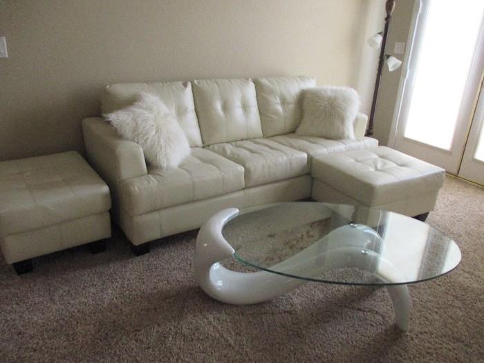 This couch wit the two matching ottomans and that amazing coffee table are really fantastic.  Soft, comfortable, small in size so they fit most rooms, and the list of fabulousness goes on and on.