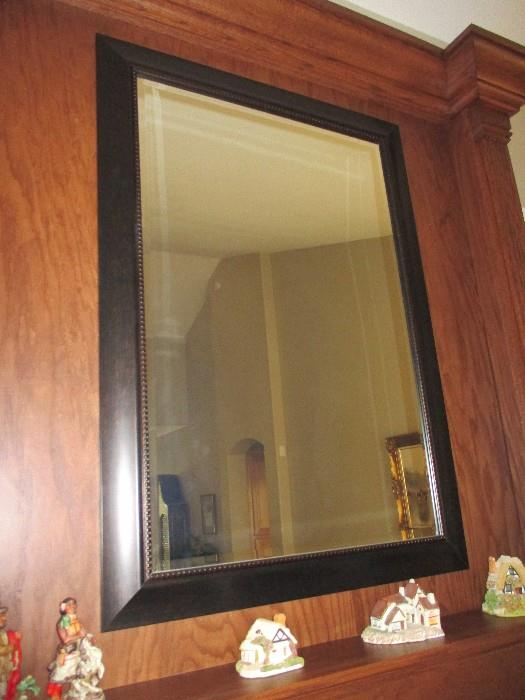 This mirror over the fireplace is really larger than it appears in the picture.